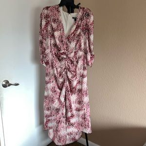 Express new with tags. Lons sleeve rouched dress. Multi color pink/blk/cream/brw